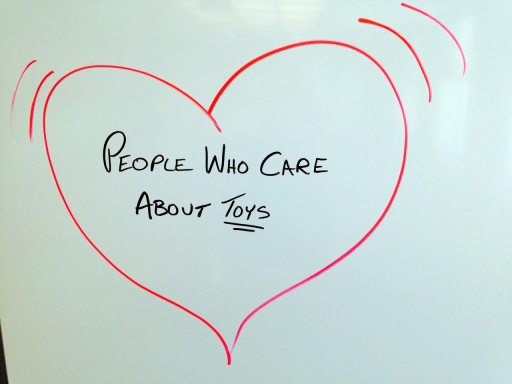 heart with "People who love toys" written in it