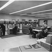 Employees working in a technology office.